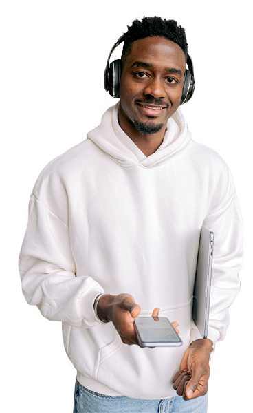 man stood with headphones on, holding a mobile phone
